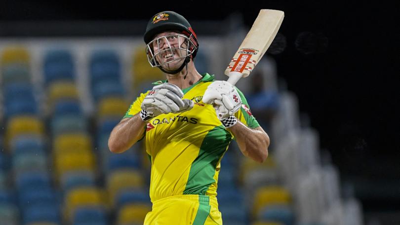 Mitchell Marsh of Australia hits 6 during the 3rd and final ODI between West Indies and Australia at Kensington Oval, Bridgetown, Barbados, on July 26, 2021.S (Photo by Randy Brooks / AFP)